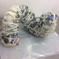 I used scrunched up newspaper to bulk the sculpture. I secured it with masking tape.